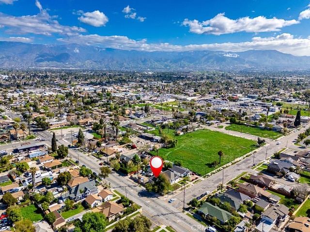 aerial view featuring a residential view and a mountain view