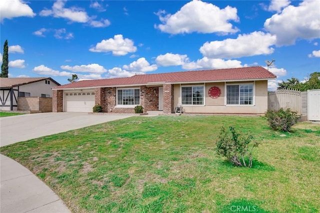 ranch-style home with a gate, fence, an attached garage, concrete driveway, and a front yard