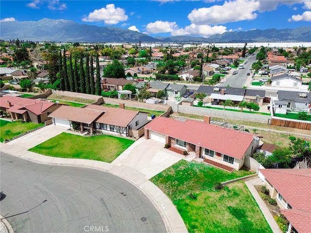 drone / aerial view featuring a mountain view and a residential view