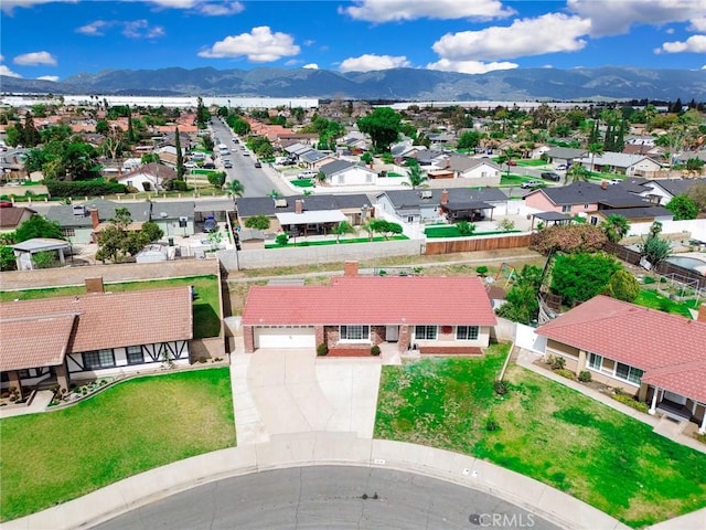aerial view with a residential view and a mountain view