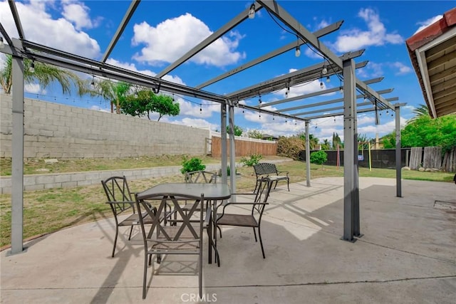 view of patio with outdoor dining area, a fenced backyard, and a pergola