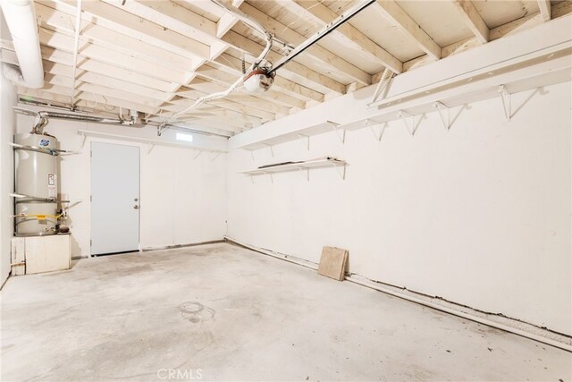 garage featuring strapped water heater