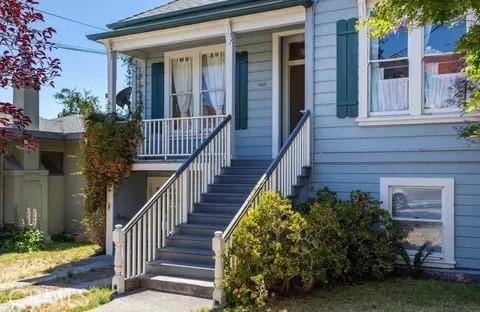 entrance to property with a porch