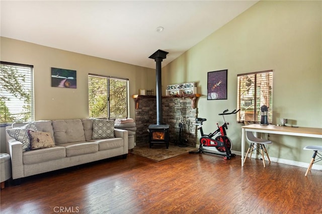31662 Panorama Dr, Running Springs, CA 92382 - living room with a wood stove, wood finished floors, high vaulted ceiling, and baseboards