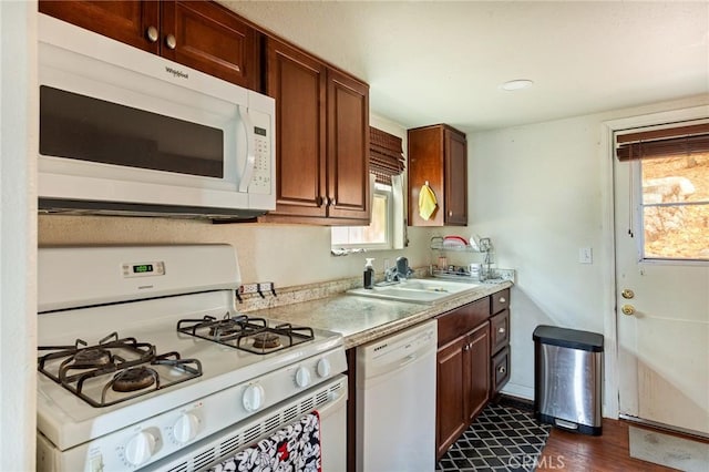 31662 Panorama Dr, Running Springs, CA 92382 - kitchen with white appliances, a sink, light countertops, and dark wood-style flooring