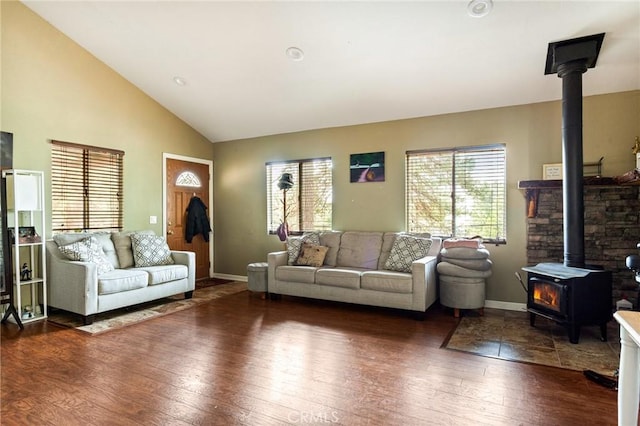 31662 Panorama Dr, Running Springs, CA 92382 - living area featuring a wood stove, hardwood / wood-style floors, baseboards, and high vaulted ceiling