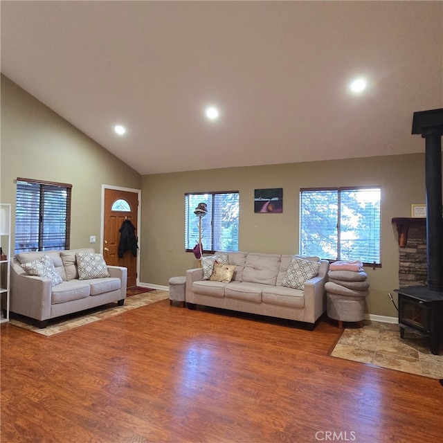 31662 Panorama Dr, Running Springs, CA 92382 - living area featuring a wood stove, recessed lighting, wood finished floors, baseboards, and high vaulted ceiling