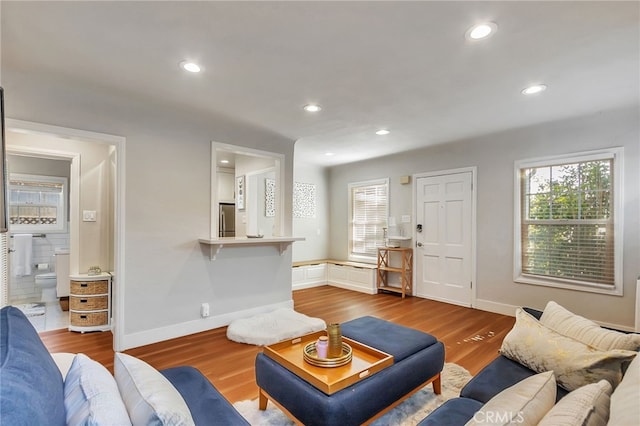 1012 S 11th St, San Jose, CA 95112 - living area featuring wood finished floors, plenty of natural light, recessed lighting, and baseboards
