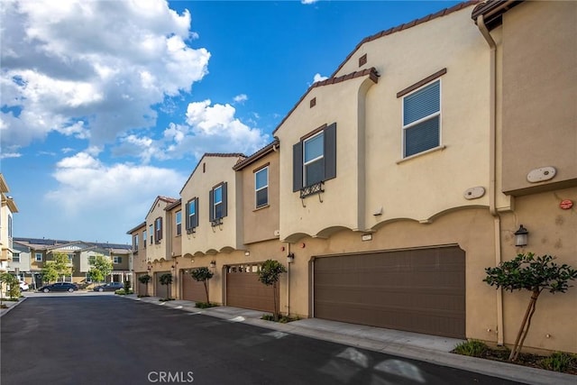 16022 Voyager Ave, Chino, CA 91708 - view of asphalt street with a residential view
