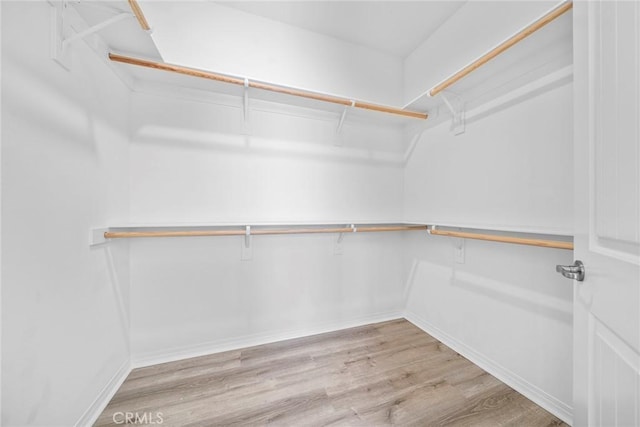 16022 Voyager Ave, Chino, CA 91708 - spacious closet featuring wood finished floors