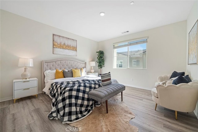 16022 Voyager Ave, Chino, CA 91708 - bedroom with wood finished floors and baseboards