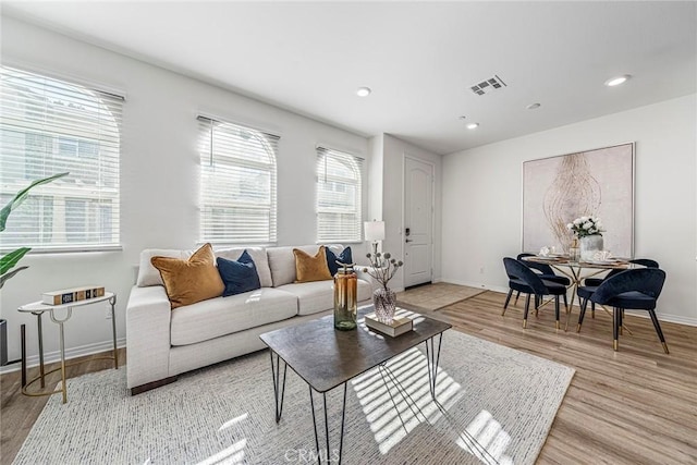 16022 Voyager Ave, Chino, CA 91708 - living area featuring light wood-style flooring, recessed lighting, and baseboards