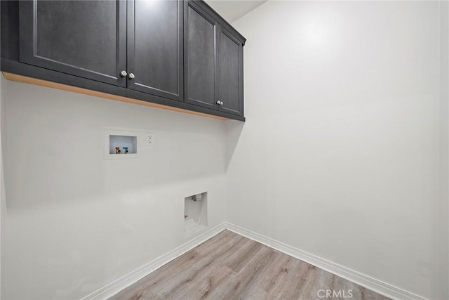 16022 Voyager Ave, Chino, CA 91708 - washroom with cabinet space, light wood-style floors, washer hookup, and baseboards