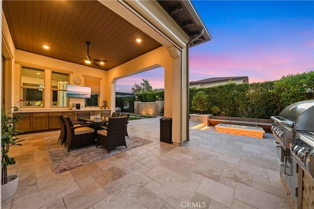 107 Balance, Irvine, CA 92618 - view of patio with area for grilling, outdoor dining space, and an in-ground hot tub