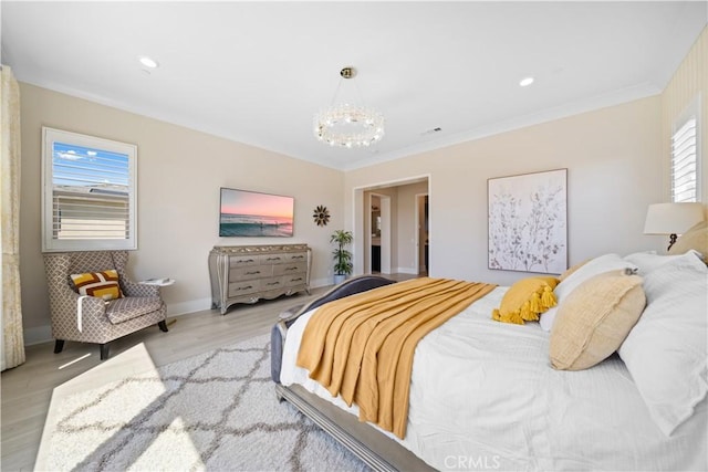107 Balance, Irvine, CA 92618 - bedroom featuring a chandelier, multiple windows, wood finished floors, and crown molding