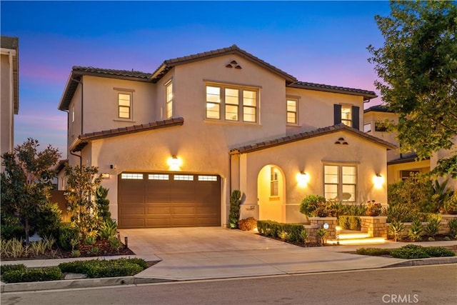107 Balance, Irvine, CA 92618 - mediterranean / spanish home with a tile roof, an attached garage, driveway, and stucco siding