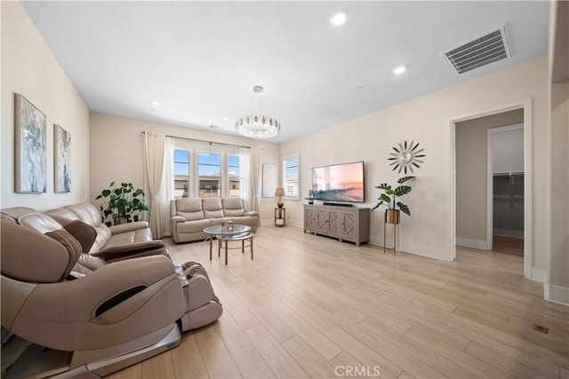107 Balance, Irvine, CA 92618 - living area featuring a chandelier, light wood finished floors, and recessed lighting