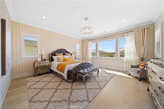 107 Balance, Irvine, CA 92618 - bedroom with light wood-style flooring, multiple windows, crown molding, and a chandelier