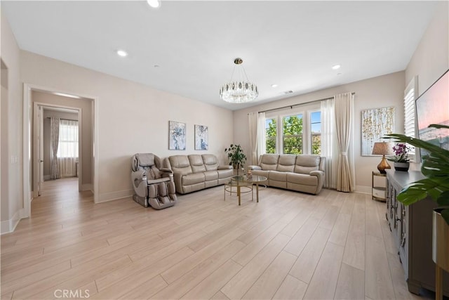 107 Balance, Irvine, CA 92618 - living room featuring plenty of natural light, a chandelier, light wood finished floors, and recessed lighting
