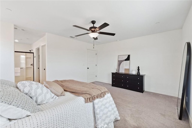 carpeted bedroom featuring a ceiling fan, baseboards, and visible vents