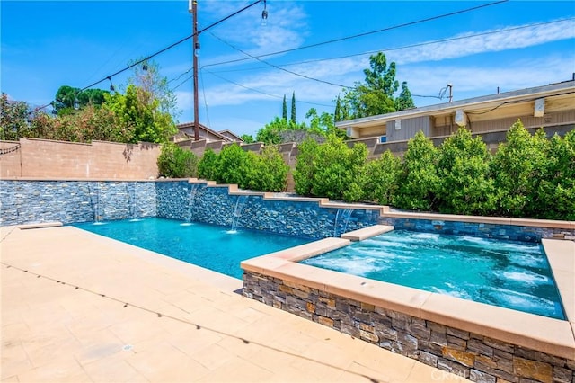view of pool featuring a fenced backyard, an in ground hot tub, and a fenced in pool