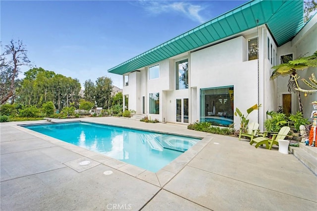 pool featuring a patio