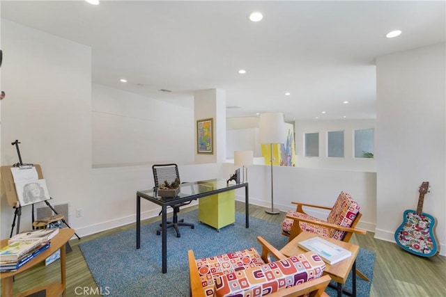 office area featuring visible vents, baseboards, recessed lighting, and wood finished floors