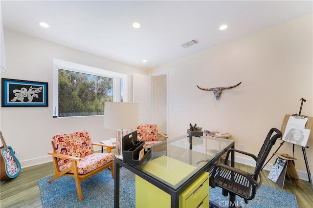 home office with visible vents, baseboards, recessed lighting, and wood finished floors
