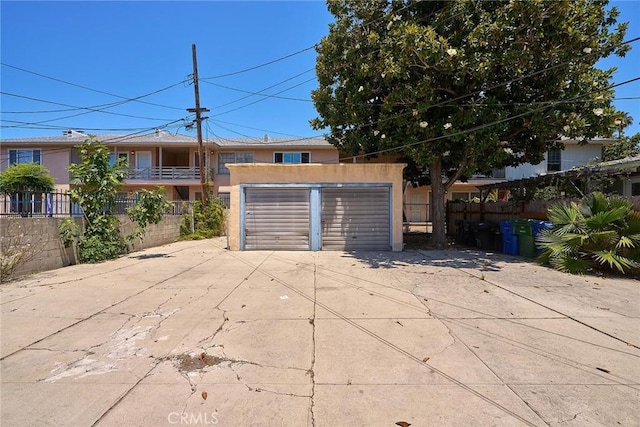 detached garage with fence