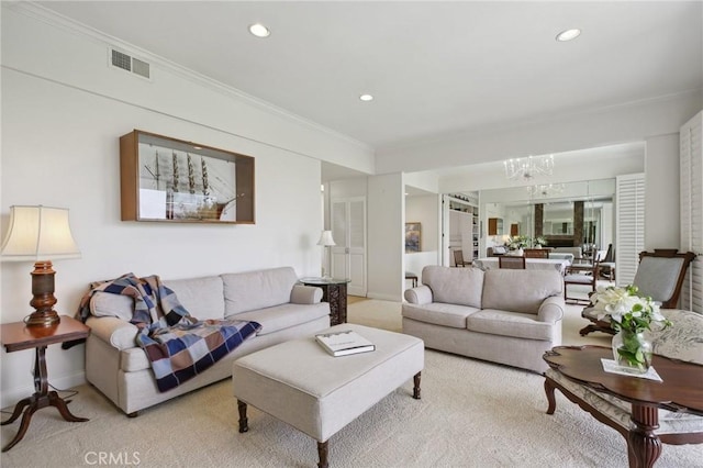 living room with light colored carpet, recessed lighting, a chandelier, and crown molding
