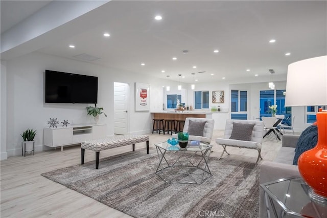 1657 S Sunrise Way, Palm Springs, CA 92264 - living area with baseboards, light wood-style floors, and recessed lighting