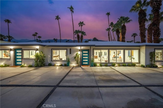 1657 S Sunrise Way, Palm Springs, CA 92264 - view of front of home featuring stucco siding