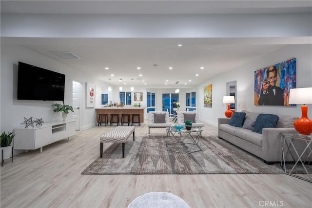 1657 S Sunrise Way, Palm Springs, CA 92264 - living room with baseboards, light wood finished floors, and recessed lighting