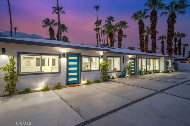 1657 S Sunrise Way, Palm Springs, CA 92264 - view of front facade featuring stucco siding