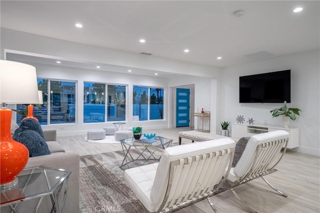 1657 S Sunrise Way, Palm Springs, CA 92264 - living area with baseboards, visible vents, wood finished floors, and recessed lighting