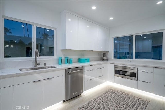 1657 S Sunrise Way, Palm Springs, CA 92264 - kitchen featuring modern cabinets and a sink