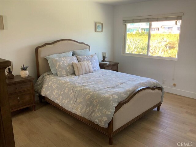 33922 Manta Ct, Dana Point, CA 92629 - bedroom with wood finished floors and baseboards