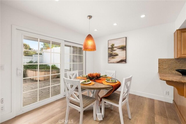 33922 Manta Ct, Dana Point, CA 92629 - dining area with baseboards, light wood finished floors, and recessed lighting