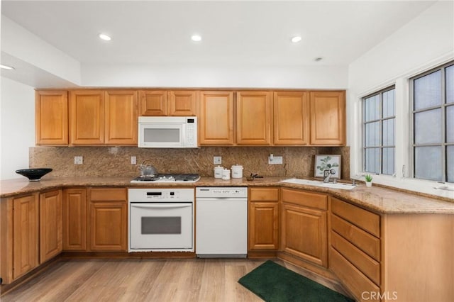 33922 Manta Ct, Dana Point, CA 92629 - kitchen featuring tasteful backsplash, a sink, white appliances, and light wood-style floors