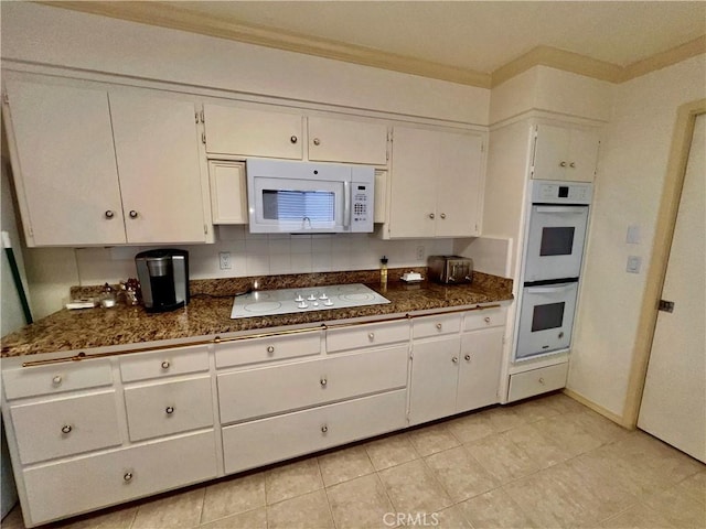 2117 Glenn St, Los Osos, CA 93402 - kitchen with white appliances, white cabinetry, ornamental molding, and light tile patterned floors