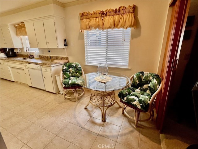 2117 Glenn St, Los Osos, CA 93402 - kitchen with white dishwasher, light tile patterned flooring, a sink, crown molding, and white cabinets