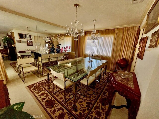 2117 Glenn St, Los Osos, CA 93402 - dining room featuring a textured ceiling, a chandelier, and crown molding