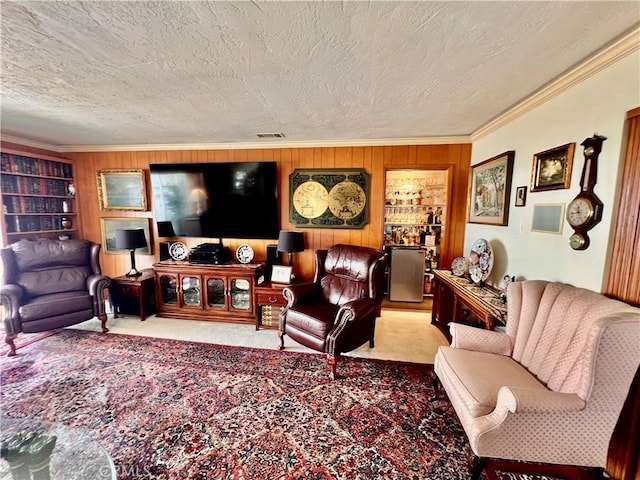 2117 Glenn St, Los Osos, CA 93402 - carpeted living room with ornamental molding, a textured ceiling, and wood walls