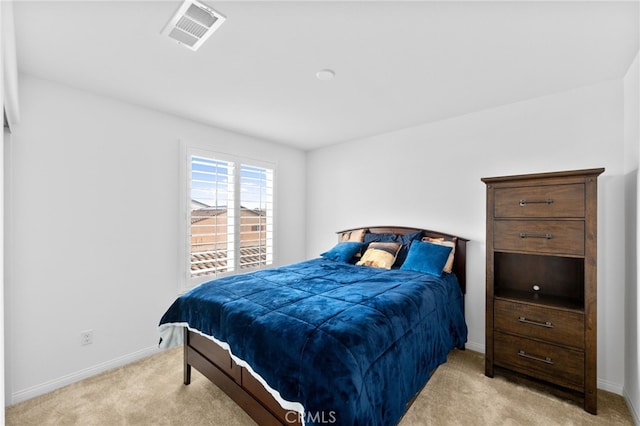 5053 Moon Eye Way, Hemet, CA 92545 - bedroom with light colored carpet, visible vents, and baseboards
