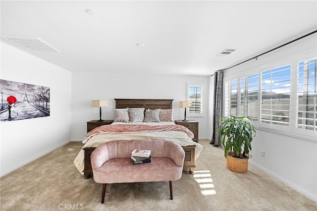 5053 Moon Eye Way, Hemet, CA 92545 - bedroom with baseboards, visible vents, and light carpet