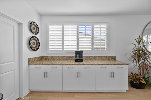 5053 Moon Eye Way, Hemet, CA 92545 - interior space with white cabinets and light wood-style flooring