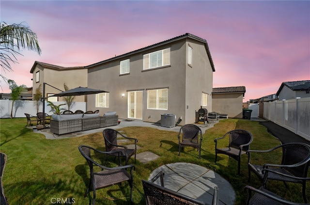 5053 Moon Eye Way, Hemet, CA 92545 - rear view of property with a fenced backyard, stucco siding, outdoor lounge area, and a patio area