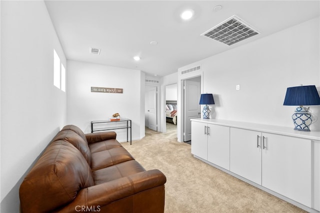 5053 Moon Eye Way, Hemet, CA 92545 - living room featuring recessed lighting, light carpet, and visible vents