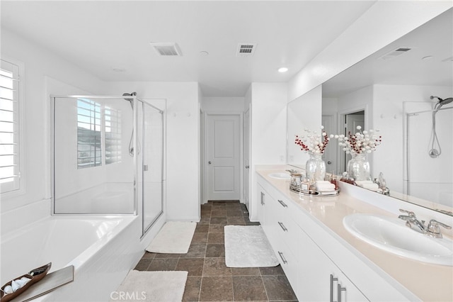 5053 Moon Eye Way, Hemet, CA 92545 - bathroom featuring a sink, a shower stall, and visible vents