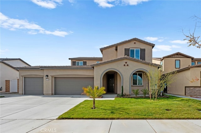 5053 Moon Eye Way, Hemet, CA 92545 - mediterranean / spanish home featuring stucco siding, driveway, a garage, and a front yard
